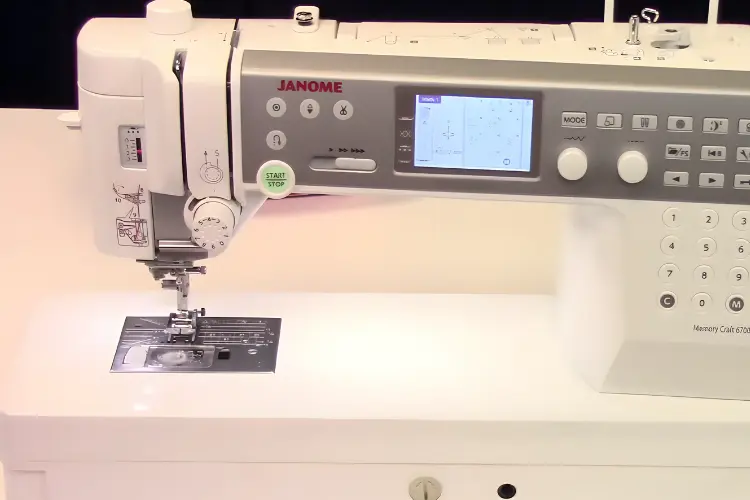 Image of a Janome 6700 sewing machine with a disconnected power cord.